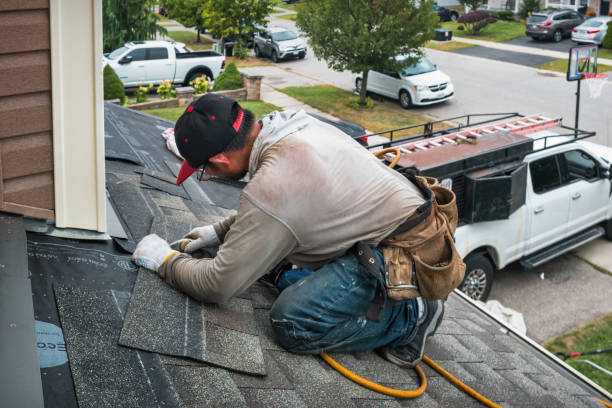 Professional Roofing technician working in Charleston, IL